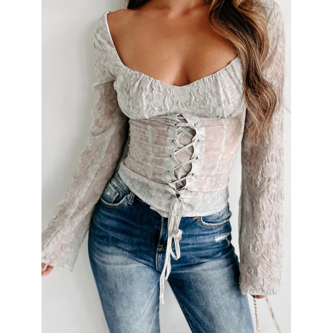 Pink long-sleeved shirt with sloping shoulders