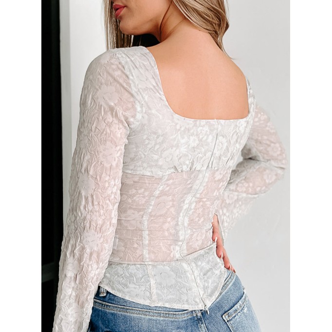 Pink long-sleeved shirt with sloping shoulders