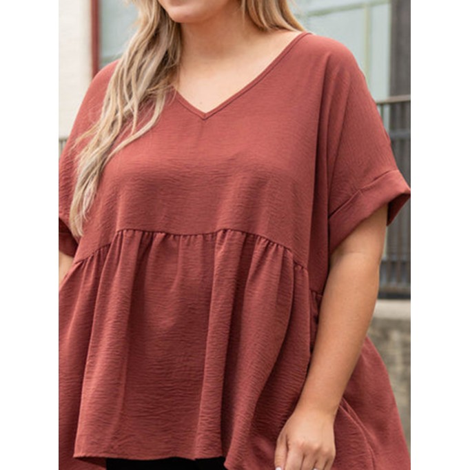 V-neck short sleeved shirt with ruffle hem